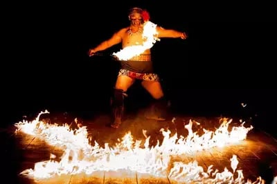 man dancing with fire