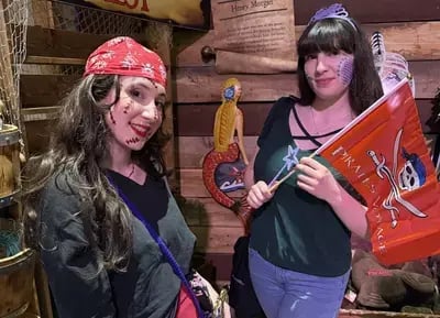 teenage girls after getting pirate and mermaid makeovers