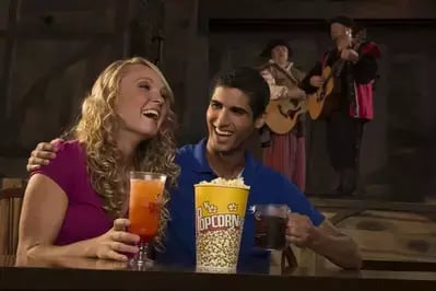 couple enjoying the preshow at Pirates Voyage