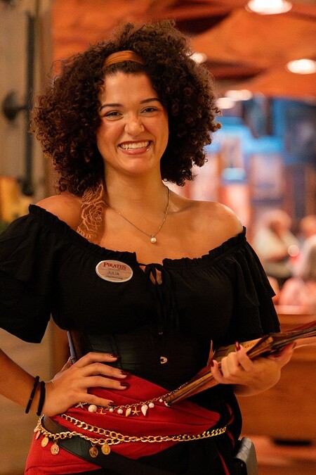 A greeter at the Pirate Voyage show