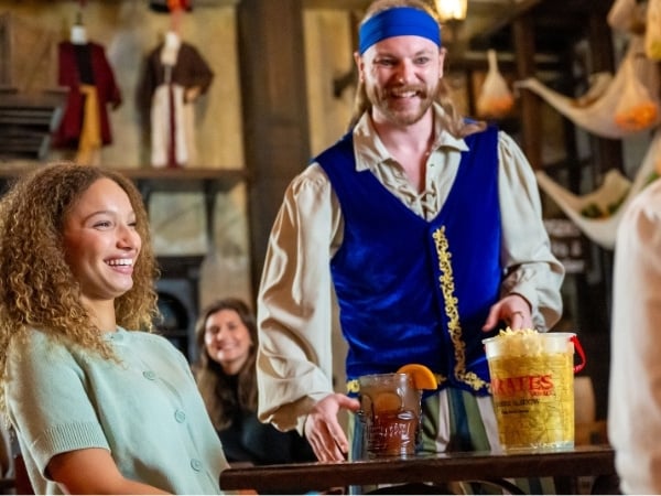 The preshow entertainment at Pirates Voyage