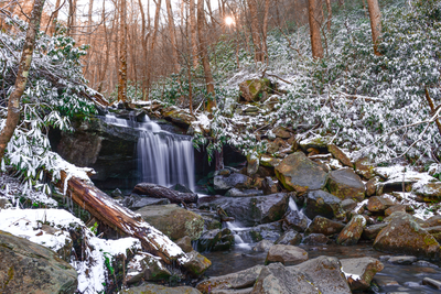 Rainbow Falls during winter with snow